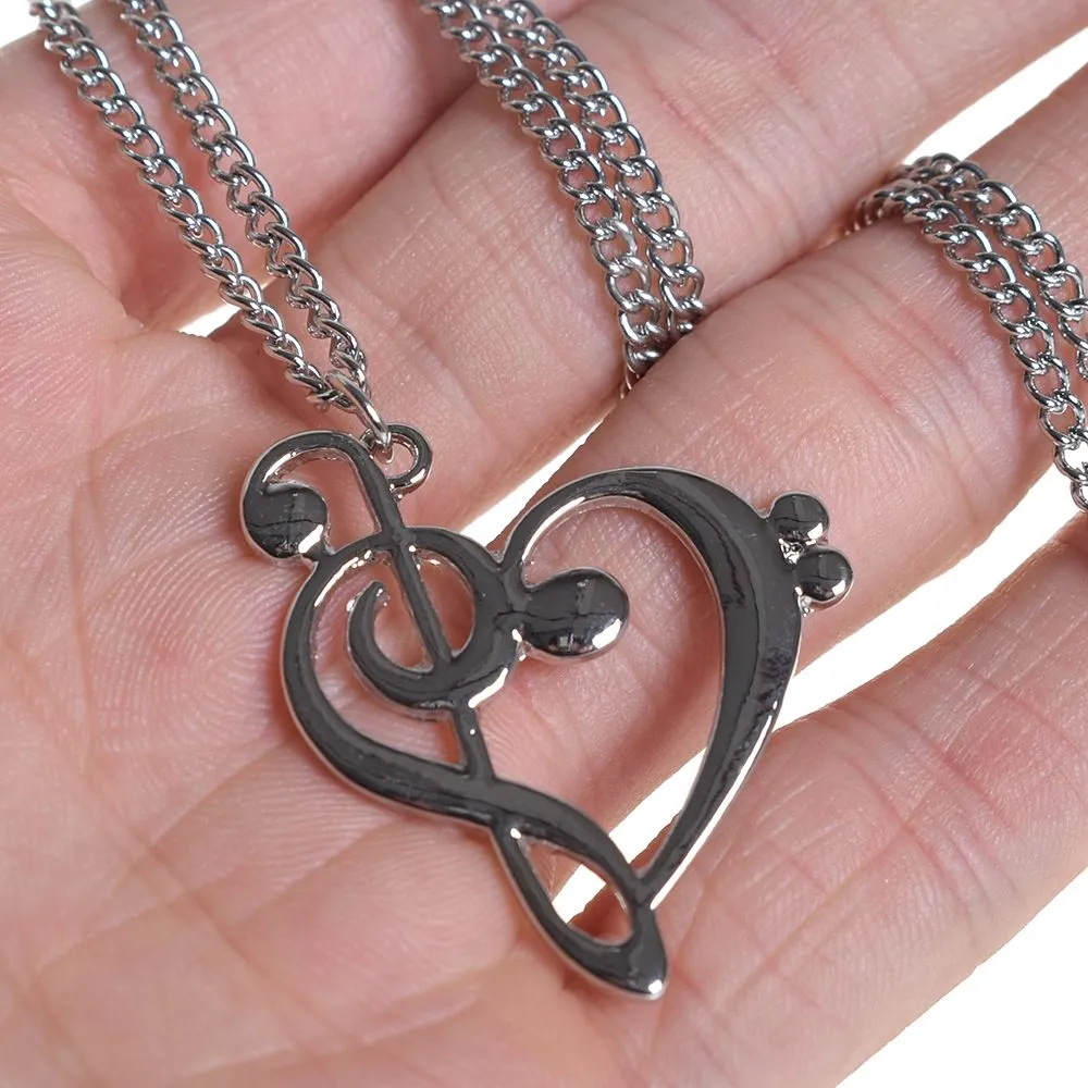 Collier femme clé de sol et fa coeur musical infini acier inoxydable